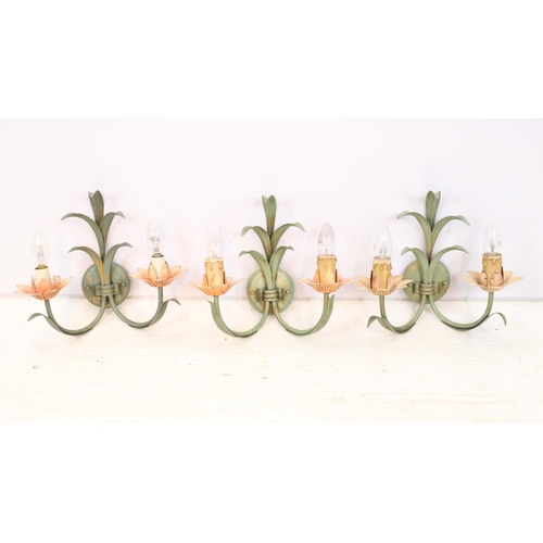 614 - Three floral design wall sconces with painted details. 30cm high.