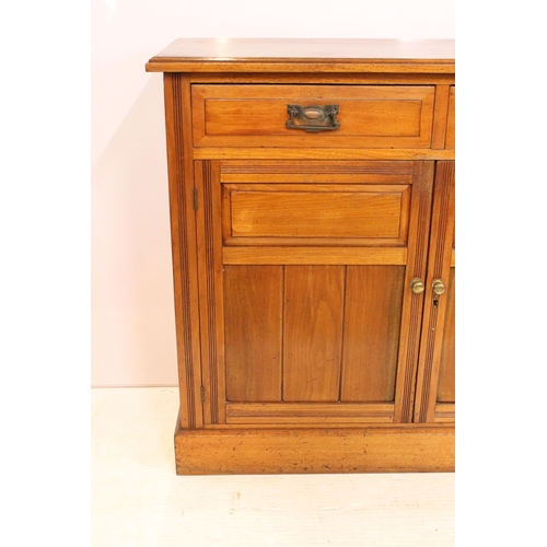 621 - 19th Century Victorian mahogany sideboard having twin cupboard doors below two drawers raised on pli... 