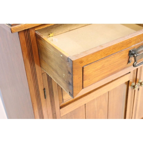 621 - 19th Century Victorian mahogany sideboard having twin cupboard doors below two drawers raised on pli... 