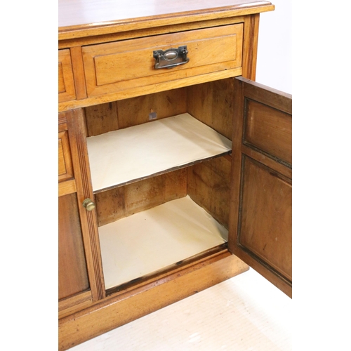 621 - 19th Century Victorian mahogany sideboard having twin cupboard doors below two drawers raised on pli... 