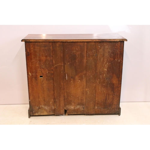 621 - 19th Century Victorian mahogany sideboard having twin cupboard doors below two drawers raised on pli... 