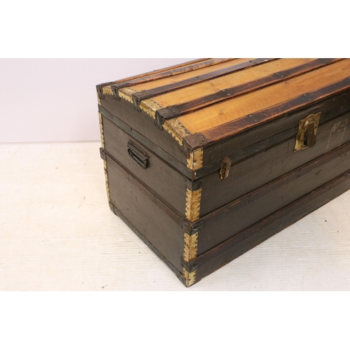 609 - Early 20th century dome topped cabin trunk, 56cm high x 91.5cm wide x 51cm deep`