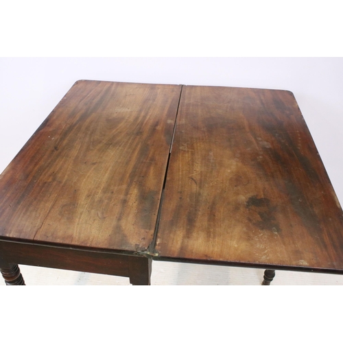 610 - 19th Century mahogany side table having a folding top with single drawer raised on turned legs with ... 