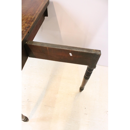 610 - 19th Century mahogany side table having a folding top with single drawer raised on turned legs with ... 