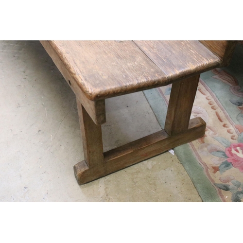 603 - Late 19th / early 20th Century oak station bench having a planked seat with pierced supports. Measur... 