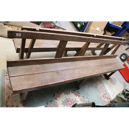 604 - Late 19th / early 20th Century oak station bench having a planked seat with pierced supports. Measur... 