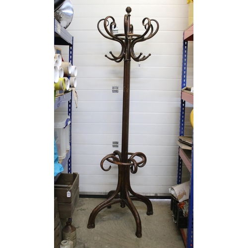 605 - Early 20th century bent wood coat stand with rotating top and stick stand to base. Measures 203cm ta... 