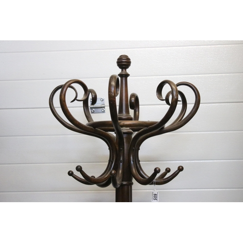 605 - Early 20th century bent wood coat stand with rotating top and stick stand to base. Measures 203cm ta... 