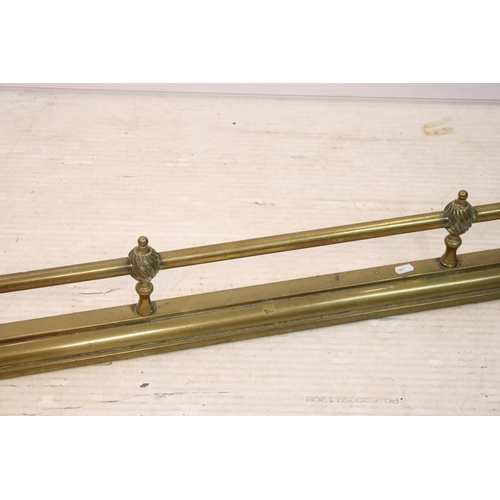 606 - 20th century brass fender fire surround together with small brass fire dogs and fireside set, approx... 