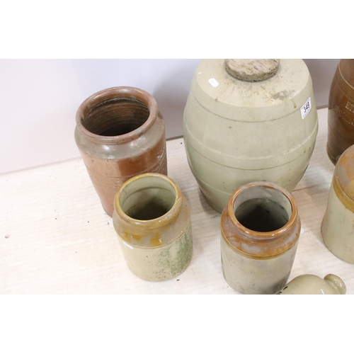 349 - Vintage stoneware barrels and jars to include Charles Tovey and Co, Bristol and Philpott's foot warm... 