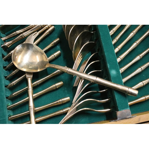 350 - Lin Oriental Gems, Thailand cutlery with wooden canteen, modelled with bamboo handles