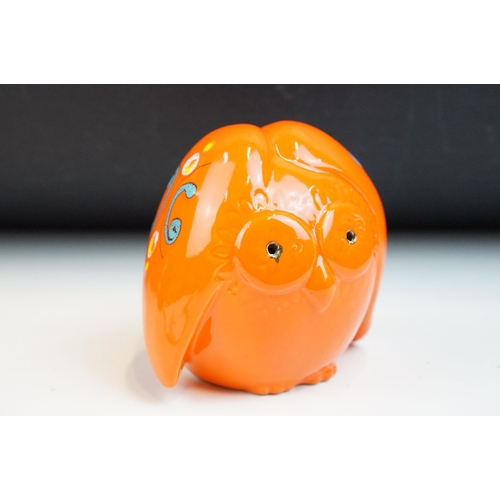 19 - In the manner of Baldelli, mid century Italian orange glazed ceramic moneybox in the form of an owl,... 