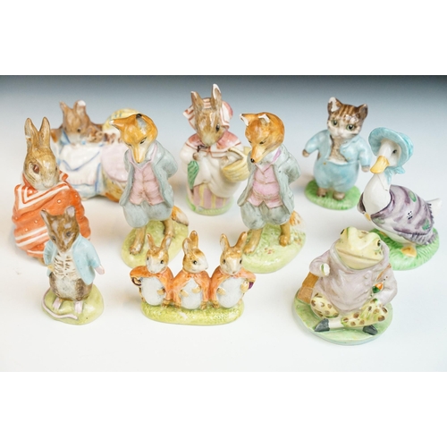 23 - Set of ten Beswick Beatrix potter figurines, to include Hunca Munca, Mrs Rabbit, Tom Kitten, Town Mo... 