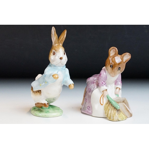 27 - Pair of Beatrix Potter figurines to include Peter Rabbit and Hunca Munca Sweeping together with a co... 