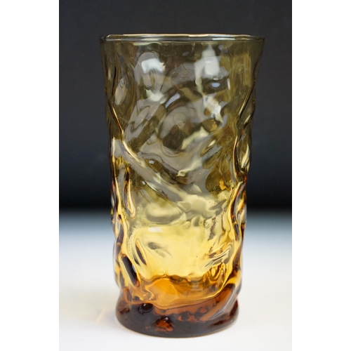 32 - Seven vintage Whitefriars style textured amber drinking glasses, 13cm high