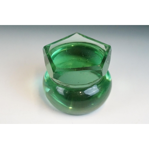 35 - Three hand blown green glass dump paperweights in varying sizes