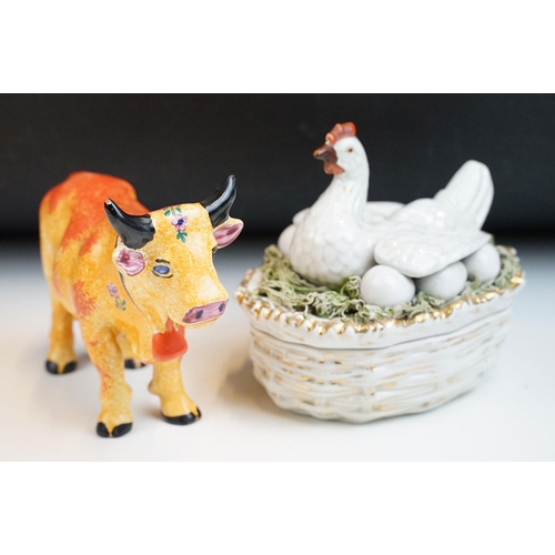 37 - Herend Village Pottery hand painted cow together with a ceramic hen lidded egg pot with gilt finish