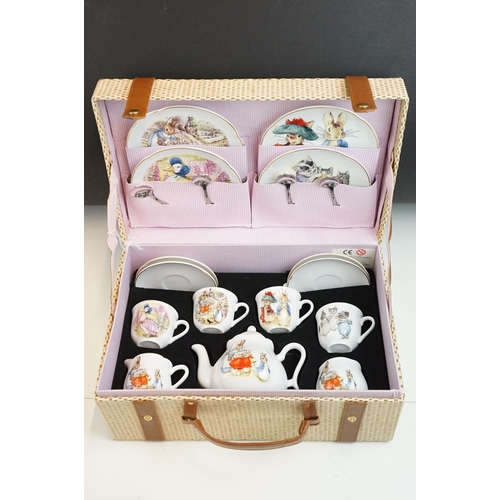 40 - Reutter Porzallan, The world of Beatrix Potter picnic basket tea set to include teapot, milk jug, li... 