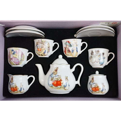 40 - Reutter Porzallan, The world of Beatrix Potter picnic basket tea set to include teapot, milk jug, li... 