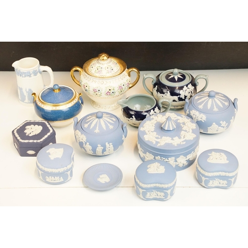 48 - Selection of Wedgwood blue Jasperware lidded pots, miniature plate, Bone China pot H2376, embossed Q... 