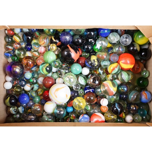 49 - Box of mixed marbles in varying sizes together with a cut glass carafe filled with marbles