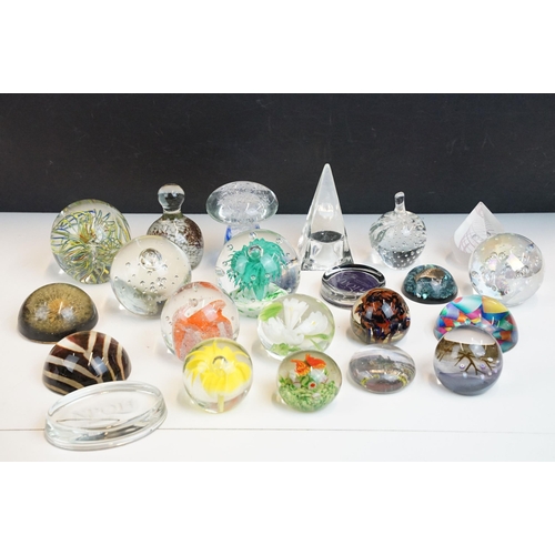 56 - Tray of twenty two glass paperweights in various sizes