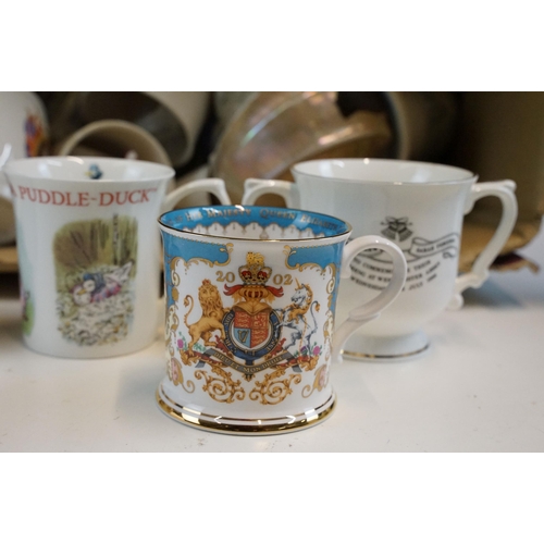 70 - Large collection of commemorative Royal and Beatrix Potter mugs and items to include Royal Worcester... 