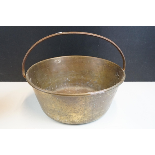 313 - Selection of antique brass and copper sauce jam pans, largest diameter 42cm