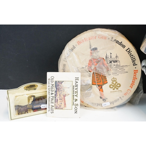 320 - Selection of vintage items to include large Beefeater gin coasters, Johnnie Walker Scotch Whisky cal... 