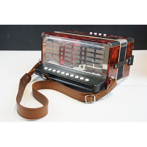 327 - Galotta one row melodeon in red pearloid with strap, in box