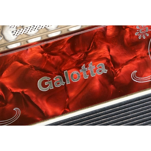 327 - Galotta one row melodeon in red pearloid with strap, in box