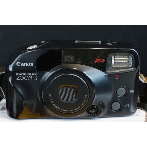 329 - Quantity of cameras to include Canon A-1 fitted with 35mm zoom lens, together with kodak, sigma, can... 