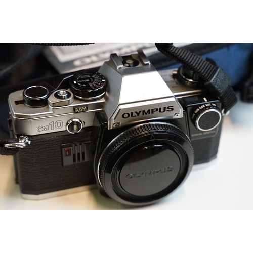 335 - Collection of photographic equipment, cameras and accessories featuring Minolta and Canon SLR's, Min... 