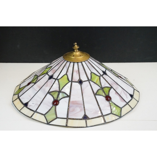 336 - A Tiffany style table lamp together with three similar lampshades