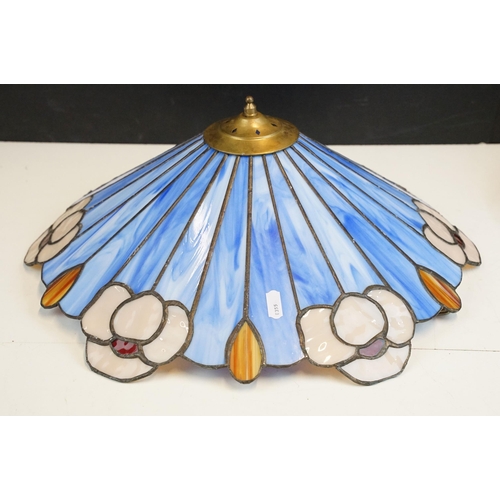 336 - A Tiffany style table lamp together with three similar lampshades