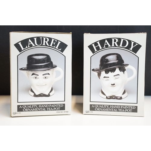 72 - Assortment of Laurel and Hardy ceramic figurines and teapots together with three Buffy the Vampire S... 