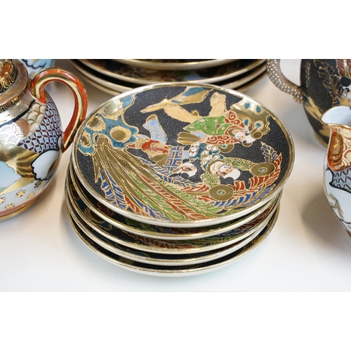 83 - Oriental hand painted and gilded tea service to include two teapots, lidded jug, milk jug, two lidde... 