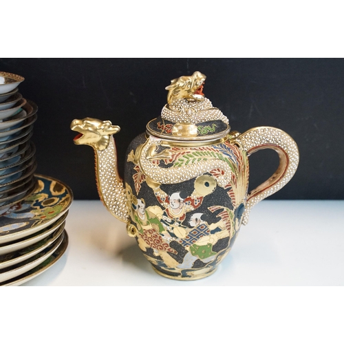 83 - Oriental hand painted and gilded tea service to include two teapots, lidded jug, milk jug, two lidde... 