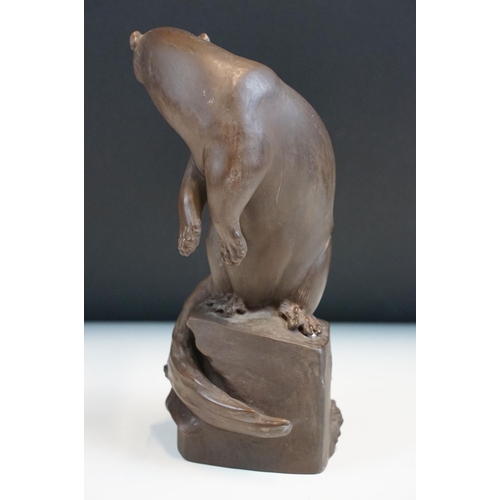 1 - Meissen Bottger Steinzeug red stoneware otter modelled perched on a rock. Impressed marks to base wi... 