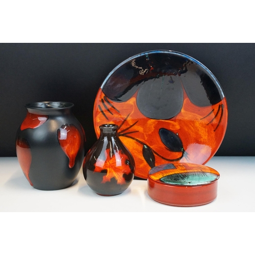 4 - Poole Pottery - group of four pieces to include a Forest Flame vase, lava vase, Gemstone powder box ... 