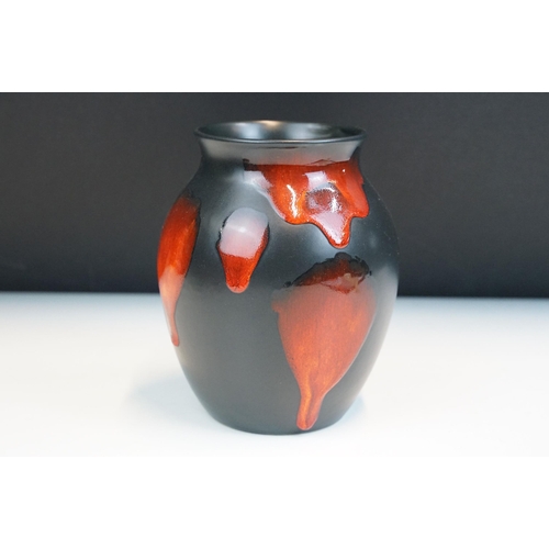 4 - Poole Pottery - group of four pieces to include a Forest Flame vase, lava vase, Gemstone powder box ... 