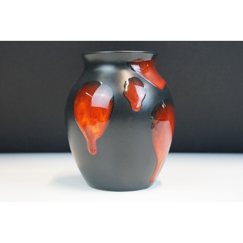 4 - Poole Pottery - group of four pieces to include a Forest Flame vase, lava vase, Gemstone powder box ... 