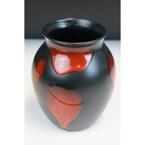 4 - Poole Pottery - group of four pieces to include a Forest Flame vase, lava vase, Gemstone powder box ... 