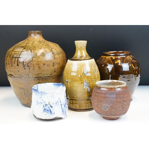 6 - Collection of studio pottery to include two Kim Ford wood fired stoneware bottles (both with impress... 