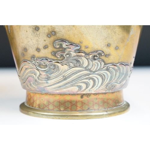 8 - Pair of Japanese Meiji mixed metal vases each decorated with moulded swallows, waves and branches wi... 