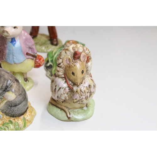 86 - Collection of Beatrix Potter Beswick figurines to include Benjamin Bunny, Mrs Tiggy-Winkle, Squirrel... 