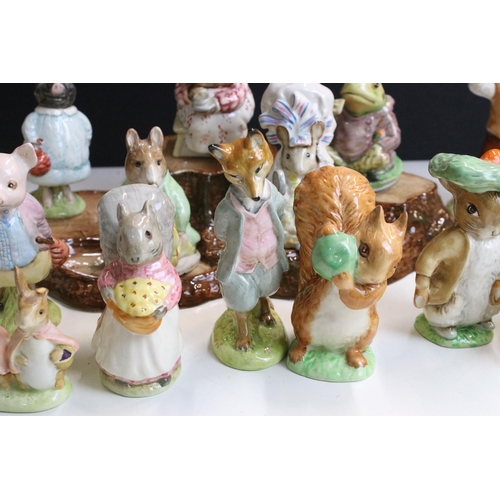 86 - Collection of Beatrix Potter Beswick figurines to include Benjamin Bunny, Mrs Tiggy-Winkle, Squirrel... 