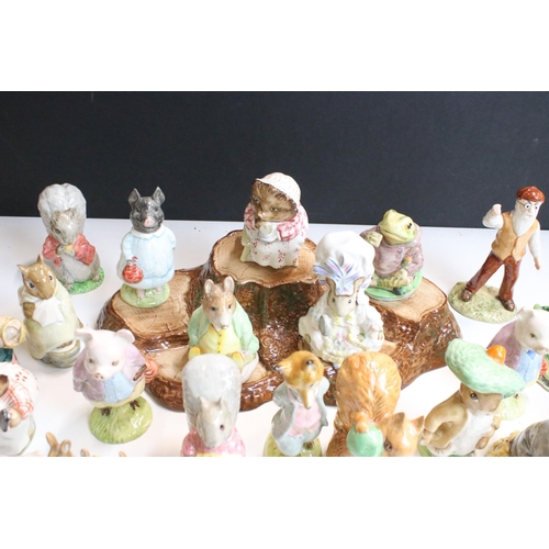 86 - Collection of Beatrix Potter Beswick figurines to include Benjamin Bunny, Mrs Tiggy-Winkle, Squirrel... 