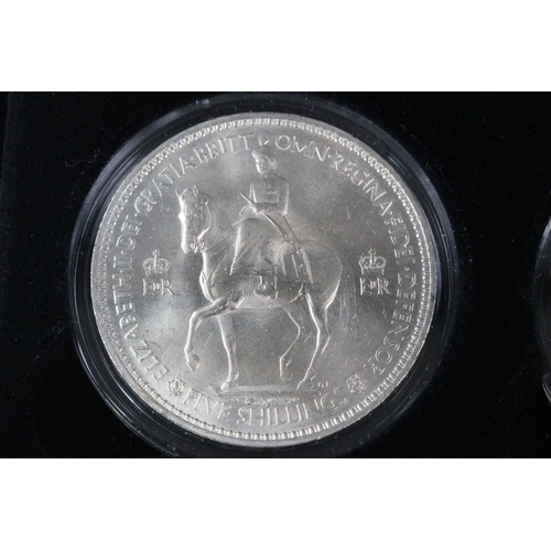 40 - A cased Queen Elizabeth II commemorative silver crown coin collection, comprising of seven full crow... 