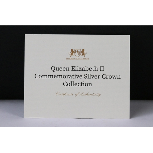 40 - A cased Queen Elizabeth II commemorative silver crown coin collection, comprising of seven full crow... 